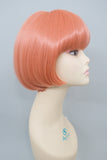 Reia wig chin length bob with bangs in color orange